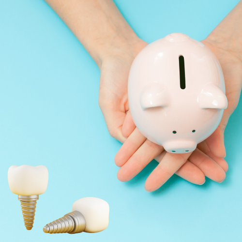 A person holding a piggy bank on blue background with dental implant elements next to their hands.
